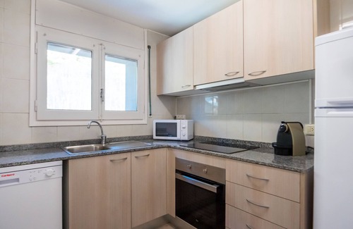 Incles Apartment | Relaxing Getaway at Can Pep Apartments with Spa & Kitchen