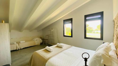 Llagostera House | Cozy Can Serrà 1786: Oceanfront Stay with Family Amenities