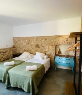Llagostera House | Cozy Can Serrà 1786: Oceanfront Stay with Family Amenities