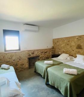 Llagostera House | Cozy Can Serrà 1786: Oceanfront Stay with Family Amenities