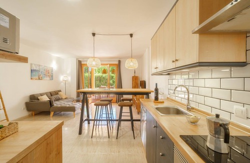 Cala Mandia Apartment | Relax at Can Suarez by Interhome: Oceanfront Oasis Awaits