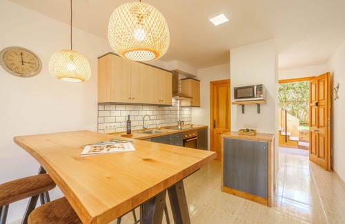 Cala Mandia Apartment | Relax at Can Suarez by Interhome: Oceanfront Oasis Awaits