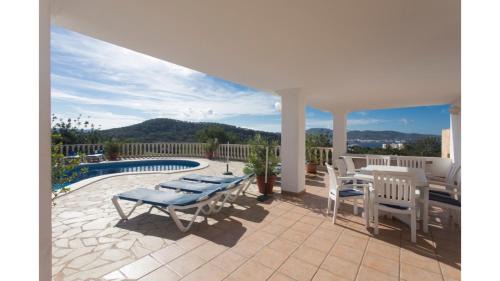 Sant Antoni de Portmany Villa | Discover Can Tunicu: Serene Sea Views Near San Antonio