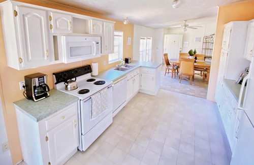 Indian Harbor Estates House | Idyllic Canal Front Escape with Pool and Boat Dock