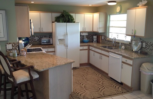 Breezeswept Beach Estates House | Waterfront Retreat with Boat Dock & Pet-Friendly Amenities