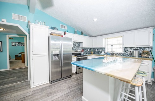 Cedar Lane House | Canal Front Home with Fishing Pier & Game Room Awaits