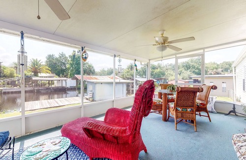 Astor House | Canal-Front Home with Private Covered Boat Dock & Waterfront Screened Porch