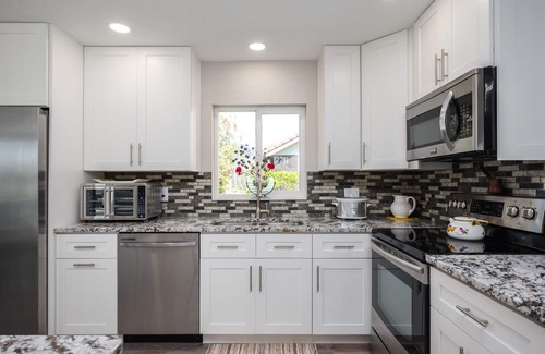 Palm Harbor House | Canal Front Retreat with Private Pool and Ocean Views!
