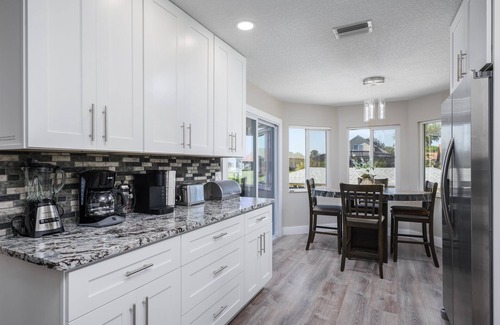 Palm Harbor House | Canal Front Retreat with Private Pool and Ocean Views!