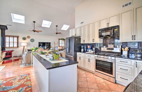 Colington Harbour House | Elegant Canalfront Oasis with Dock, Kayaks & Pool Access