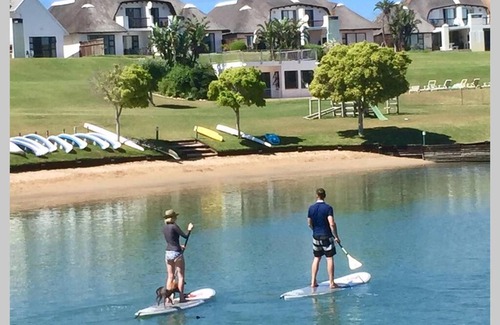 Saint Francis Bay House | Canal House: Waterfront Retreat with Pool and Breakfast