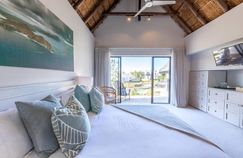 Saint Francis Bay House | Canal House: Waterfront Retreat with Pool and Breakfast