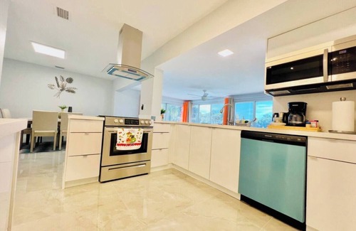 Margate House | Top-Rated Canal Oasis: Pool, Views & Pet-Friendly Retreat