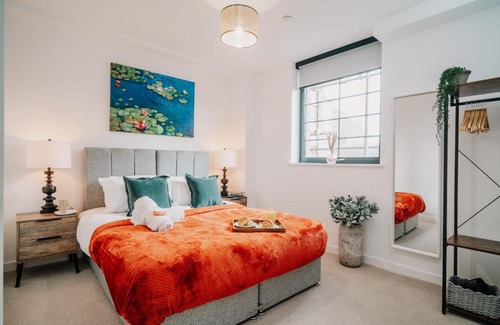 The Westside Apartment | Canal-View City Living with Fast WiFi & Family-Friendly Amenities