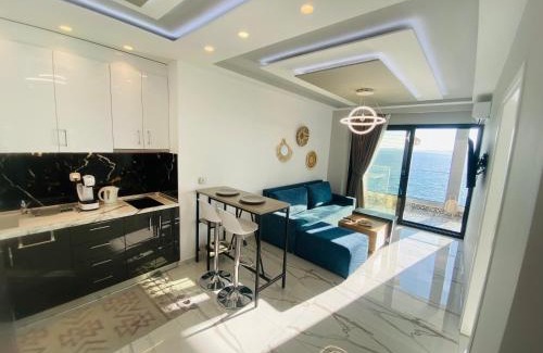 Neos Marmaras Apartment | Oceanfront Candi Suites: Guest Rated 9.9/10 for Families