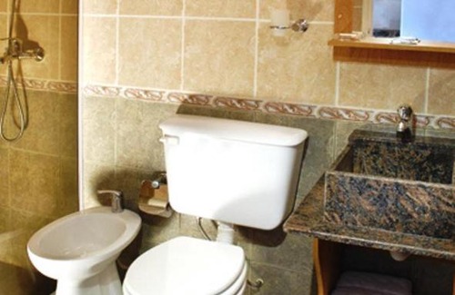 Villa General Belgrano Apartment | Welcoming Candy Apart Hotel with Oceanfront Views & Pool