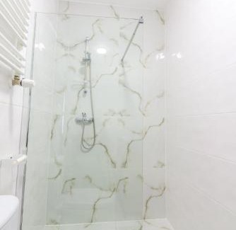 Osiedle Grunwaldzkie Apartment | Cozy Candy Room: Wheelchair Accessible & Family-Friendly