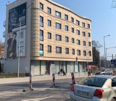 Osiedle Grunwaldzkie Apartment | Cozy Candy Room: Wheelchair Accessible & Family-Friendly