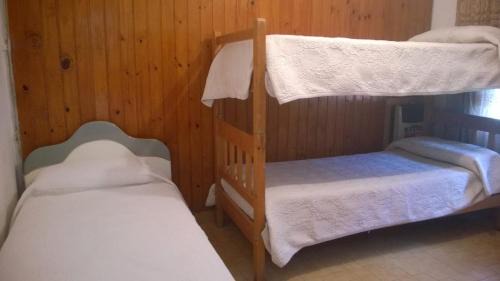 Huerta Grande Ski Chalet | Inviting Canela House: Pet-Friendly with Pool & Kitchen