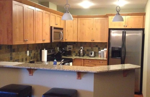 Town Centre Condo | Unforgettable Canmore Mountain View Retreat with Top Amenities