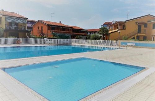 Caorle Apartment | Oceanfront Retreat at Caorle & Caorle with Pool Access