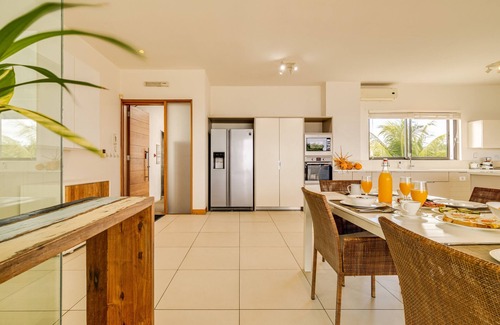 Wolmar Apartment | Cap Ouest - Oceanfront Penthouse Suite with Pool
