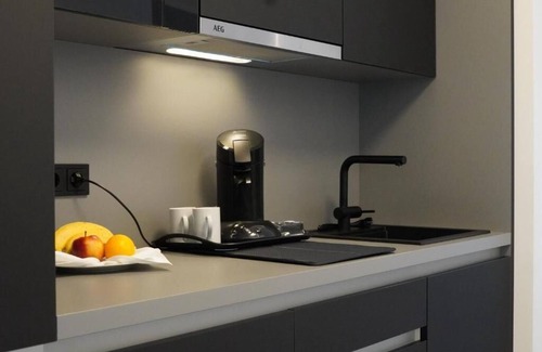 Baesweiler Apartment | Comfortable Stay at CAP1 Boardinghouse with Spa & Breakfast