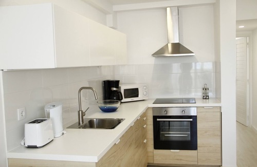 Costa de Caparica Apartment | Cozy One-Bedroom Apartment with Balcony by Costa da Caparica Beach
