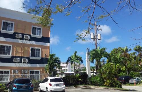 Garapan Apartment | Capital Hotel: Ocean View with Pool & Family-Friendly Amenities