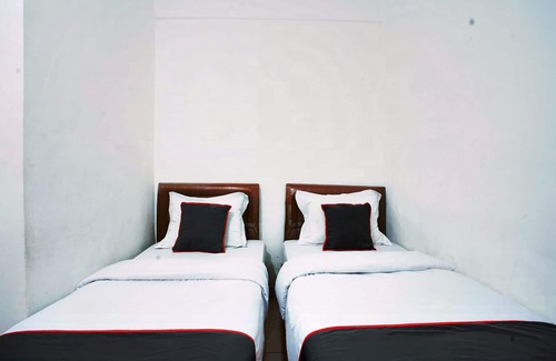 Padang Hotel | Budget-Friendly Stay at OYO 93467 Wisma Olo Syariah