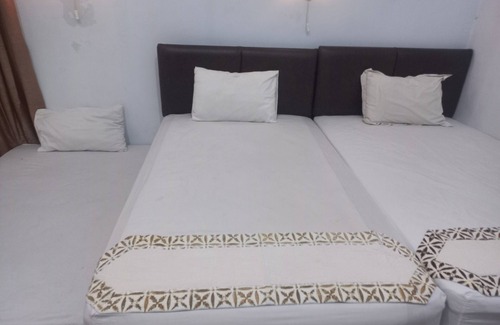 Purwokerto Hotel | Budget-Friendly Natura Guest House with Breakfast & Family Care