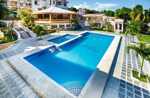Calderitas Hotel | Relaxing Oceanfront Escape at Capital O Oxtankah