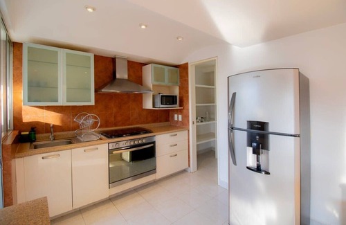 El Yaqui Condo | Guest Rated: Capitalia - Chic Renovated Retreat with Garden