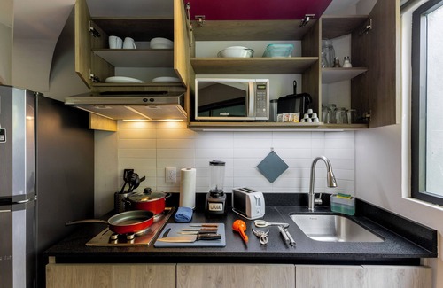 Escandon Condo | Stylish Capitalia Apartments with Spa & Kitchen Amenities