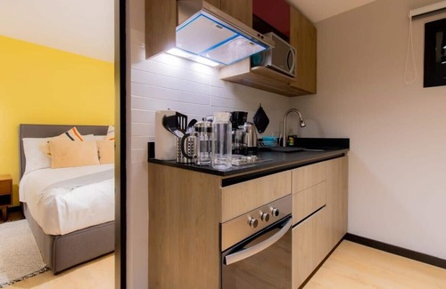 Escandon Apartment | Explore Capitalia: Downtown Rooftop Oasis with Spa & More