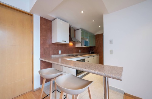 El Yaqui Condo | Experience Capitalia: Duplex with Breathtaking Views