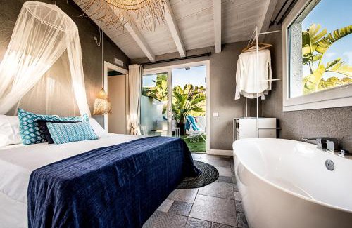 Santa Margherita di Pula Hotel | Premier CapoBlu Hotel: Oceanfront Bliss with Top Amenities