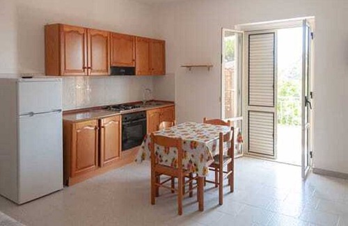 Isola di Capo Rizzuto House | Cozy Capopiccolo Apartments: Pet-Friendly with Breakfast
