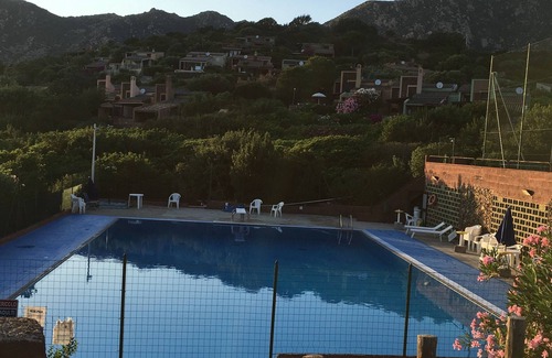 Porto Sa Ruxi House | Beachside Caposchiera Cottage with Pool & Ocean Views