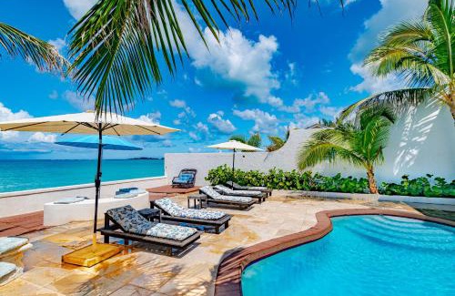 Nassau House | Caprice 14: Oceanfront Villa with Pool in Gated Community