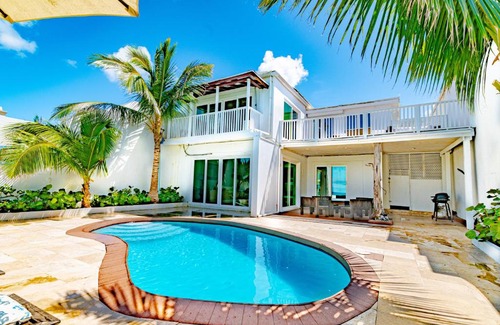 Nassau House | Caprice 14: Oceanfront Villa with Pool in Gated Community