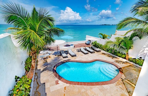 Nassau House | Caprice 14: Oceanfront Villa with Pool in Gated Community