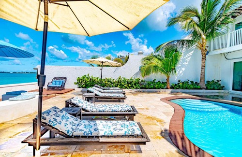 Nassau House | Caprice 14: Oceanfront Villa with Pool in Gated Community