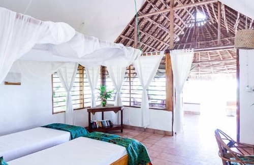 Pangani House | Relax at Capricorn Beach Cottages - Rated 9.4/10