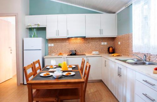 Mikros Gialos Apartment | Oceanfront Bliss at Captain Nick Aparthotel - Rated 9.2/10