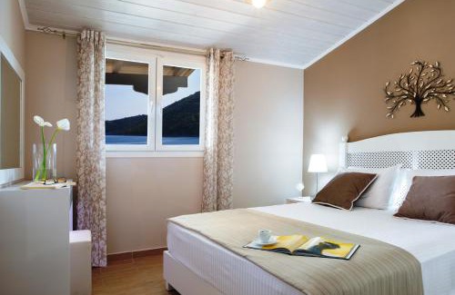 Mikros Gialos Apartment | Oceanfront Bliss at Captain Nick Aparthotel - Rated 9.2/10