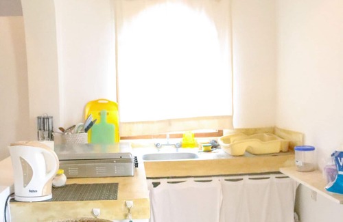 Diani Beach Apartment | Captivating 1-Bed Apartment with Garden and Breakfast