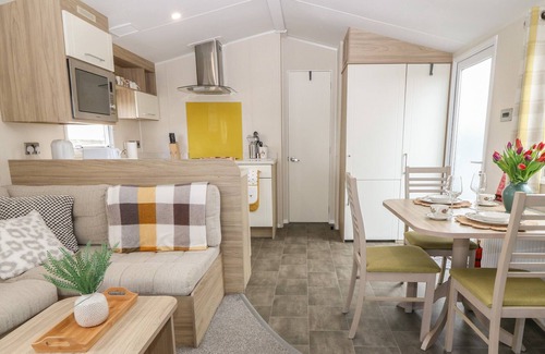 Malltraeth Cottage | Family-Friendly Caravan at Boderw with Ocean View Garden