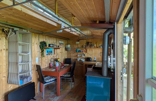 Kirch Mulsow House | Cozy Caravan for 3 Guests with Ocean View in Carinerland
