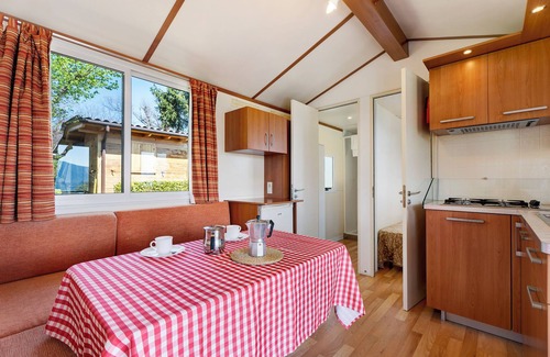 Pratolungo RV Rental | Scenic Caravan Mobile Home with Lake View and Shared Pool